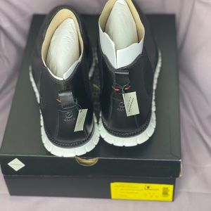 Black Cole Haan waterproof boots